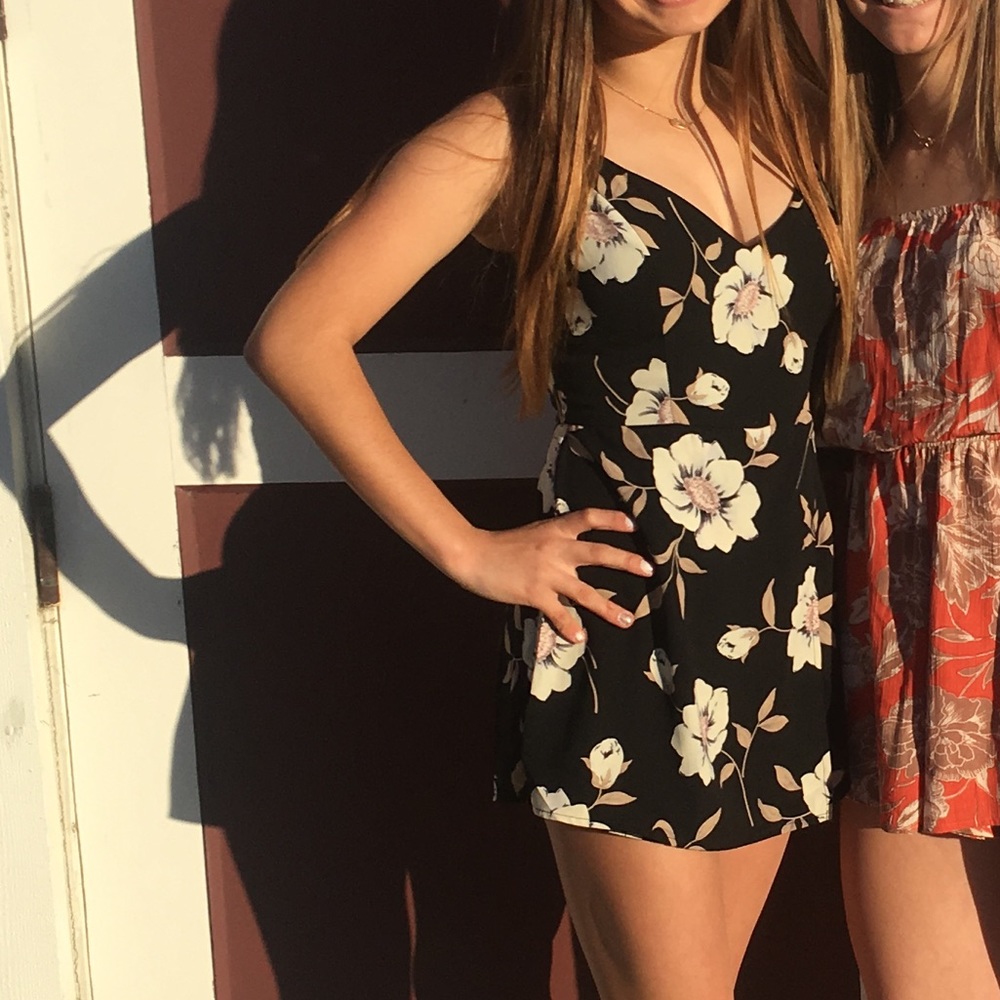 Black floral romper only used once